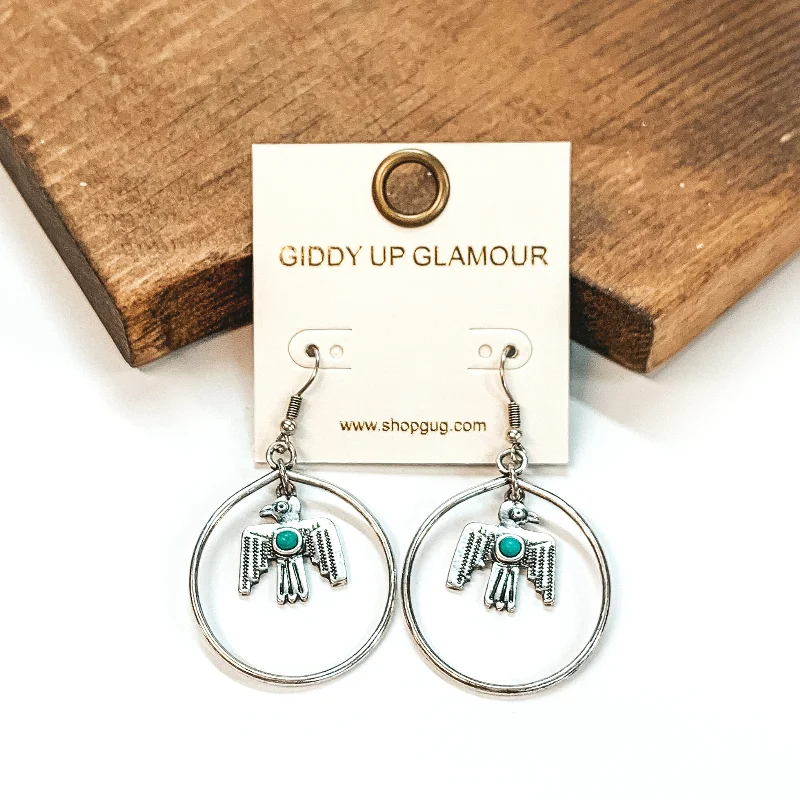 Subtle moonstone drop earrings for soft lunar elegance -Circle Drop Earrings with Hanging Thunderbird Pendant in Silver