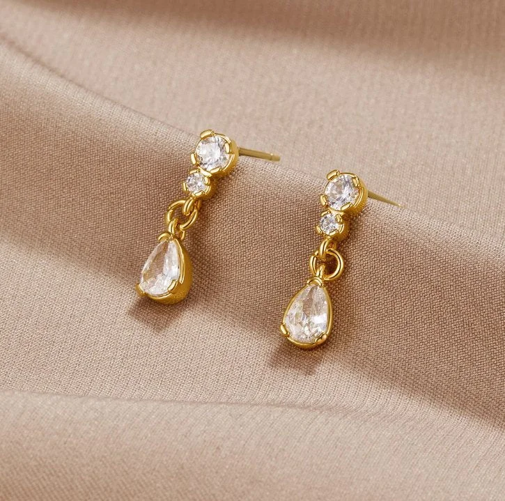 Sunny coral drop earrings for vibrant tropical flair -Yarina Crystal Teardrop Earrings