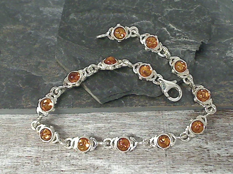 Hand-woven bracelets with colorful tribal patterns -7.25" Amber, Sterling Silver Bracelet