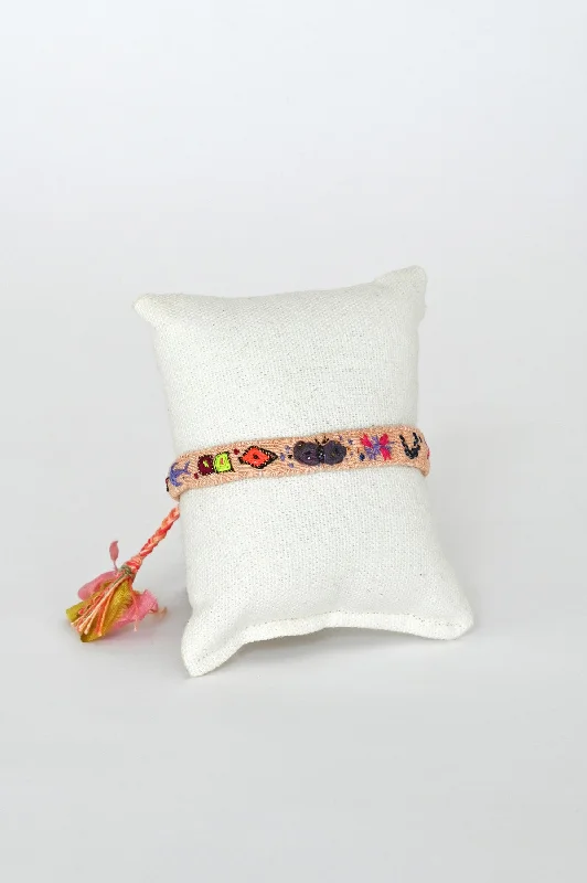 Rich garnet bracelets exuding deep red warmth -Embroidered Bracelet