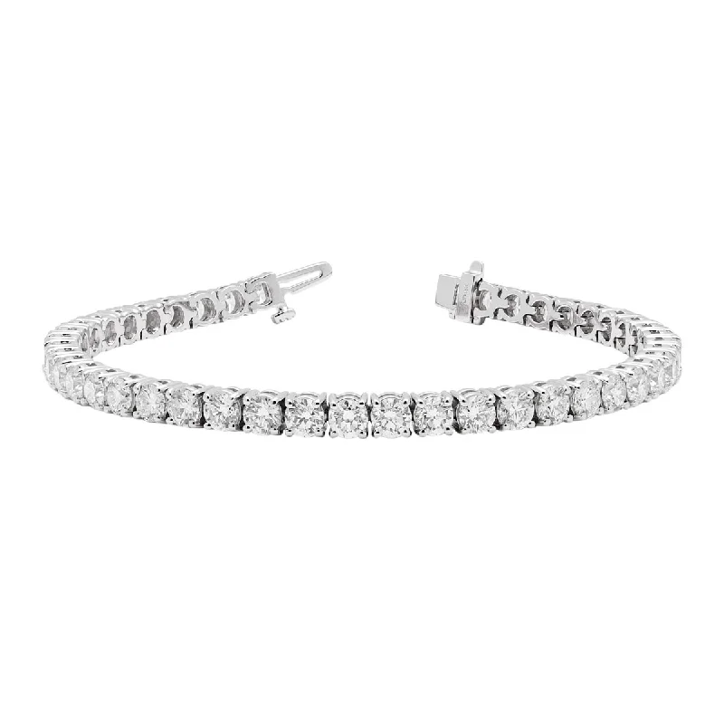 Vibrant topaz bracelets dangling in icy blue -Diamond Tennis Bracelet in 18kt White Gold (10 1/2ct tw)