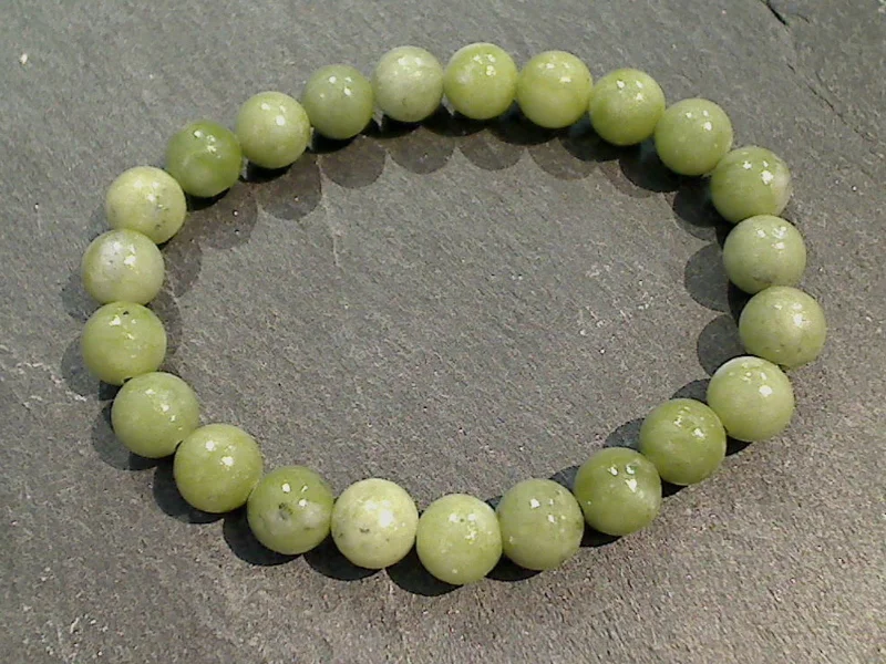 Shimmering peridot bracelets swaying with green energy -Green Jade 8MM Stretch Bracelet