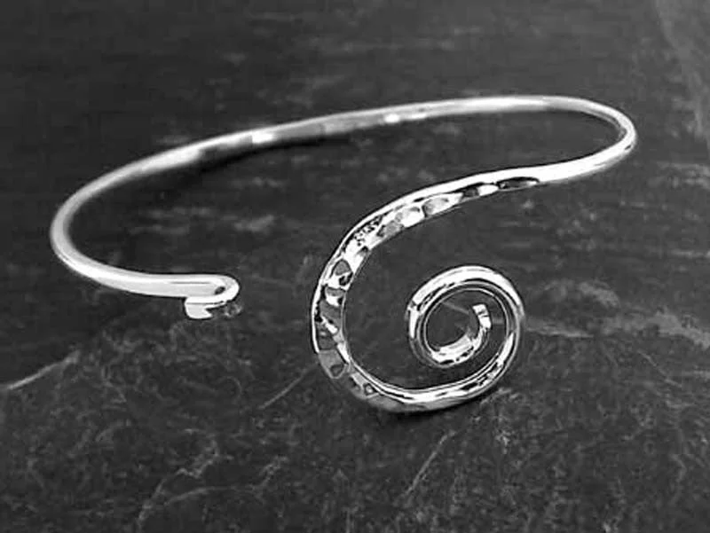 Subtle moonstone bangles for soft lunar charm -Sterling Silver Locking Swirl Bangle Bracelet