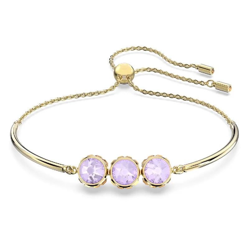 Playful tassel bracelets adding movement and flair -Swarovski Crystal Reversible Orbita Bangle Bracelet